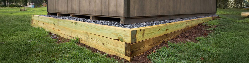 Read more about the article Shed Foundations: Choosing the Right Base for Stability & Longevity